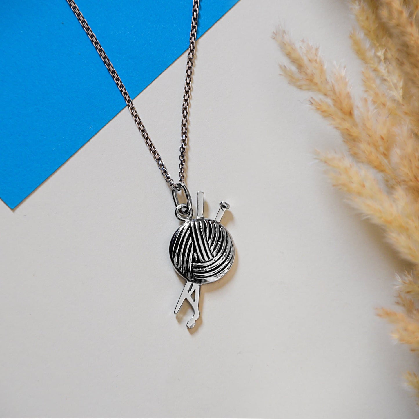 Silver Wool Ball Knitting Needle Necklace