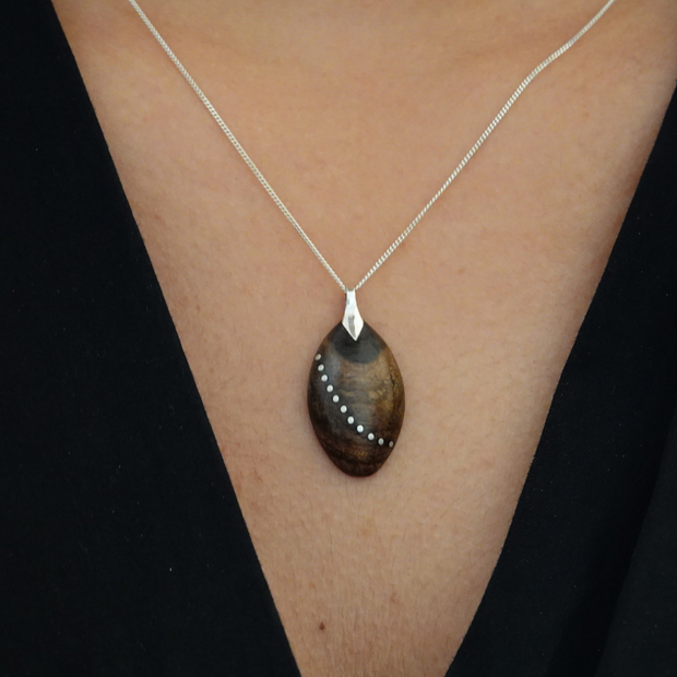 Oval wooden necklace with silver sterling